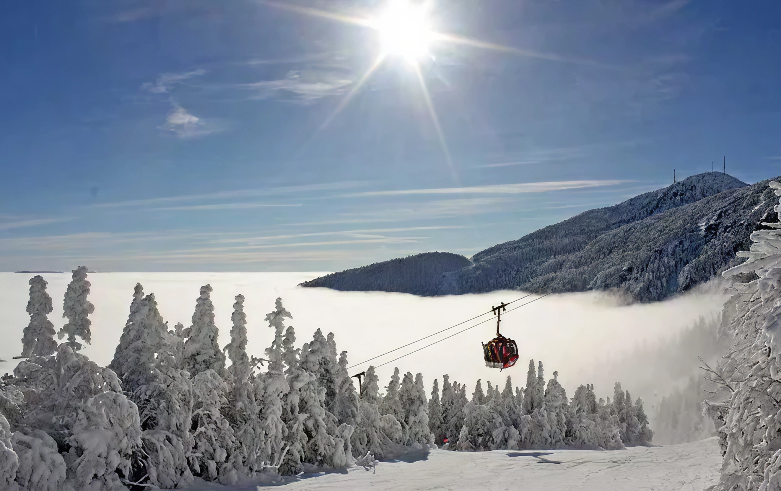 Gondola Going Up A Mountain In Stowe Vermont